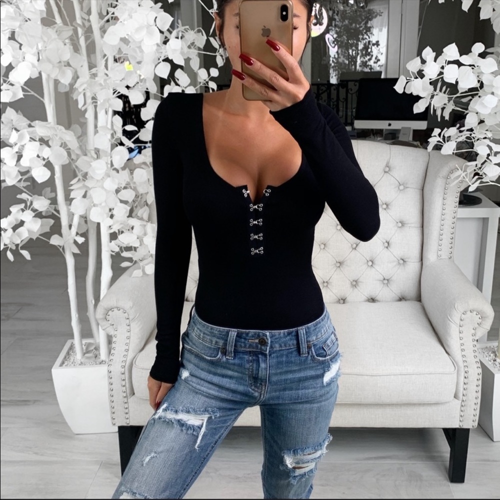 Medellin - in black body suit